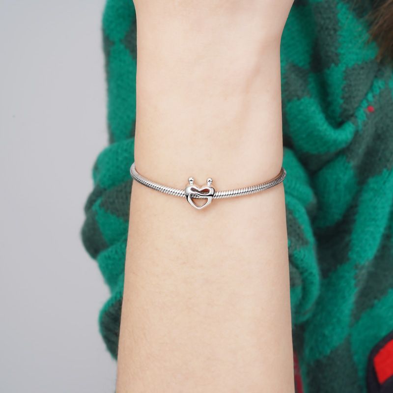 Lover Embraces Heart Charm
