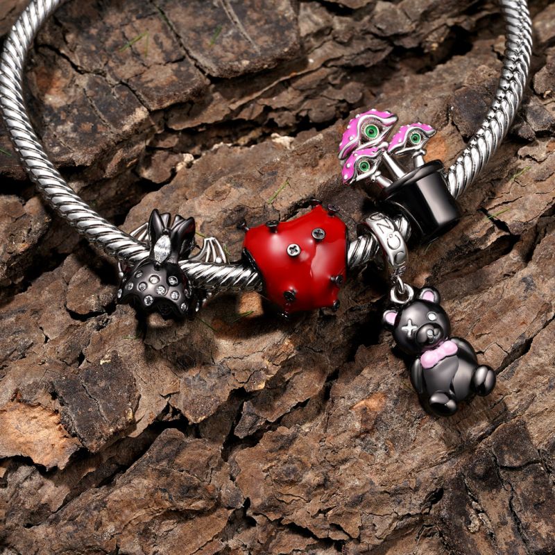 Black Bear Holding Knife Pendant